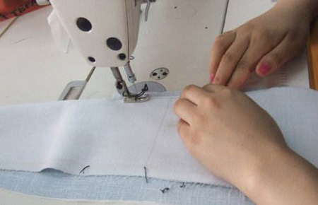 定做工作服生产中的倒回针